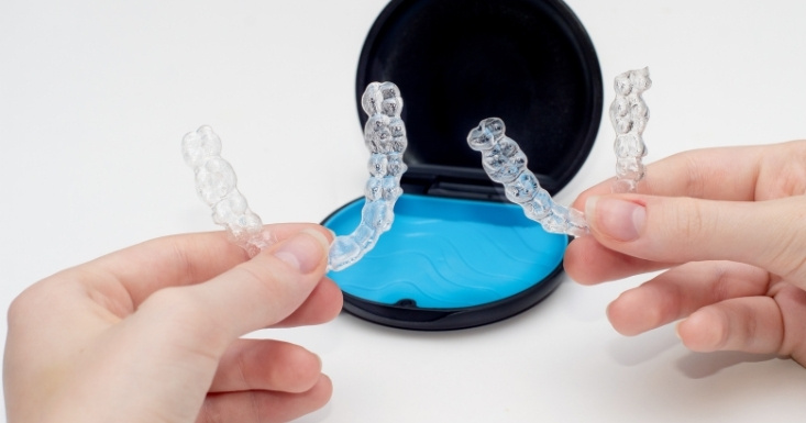Clear aligners and healthy meal planning concept