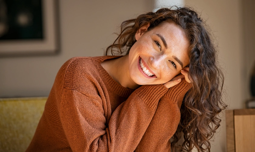 Smiling woman representing quality dental care