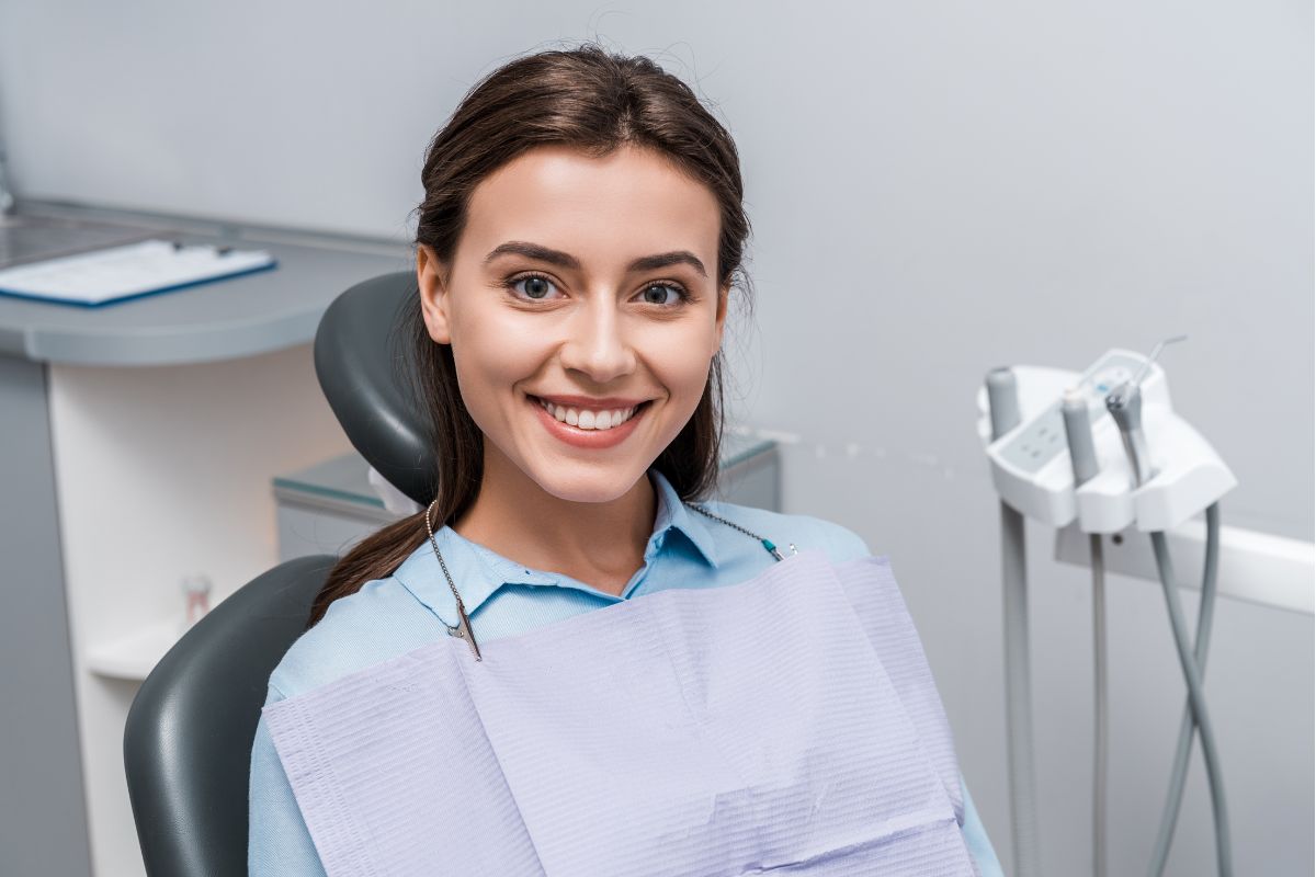 Patient smiling in a dental treatment room
