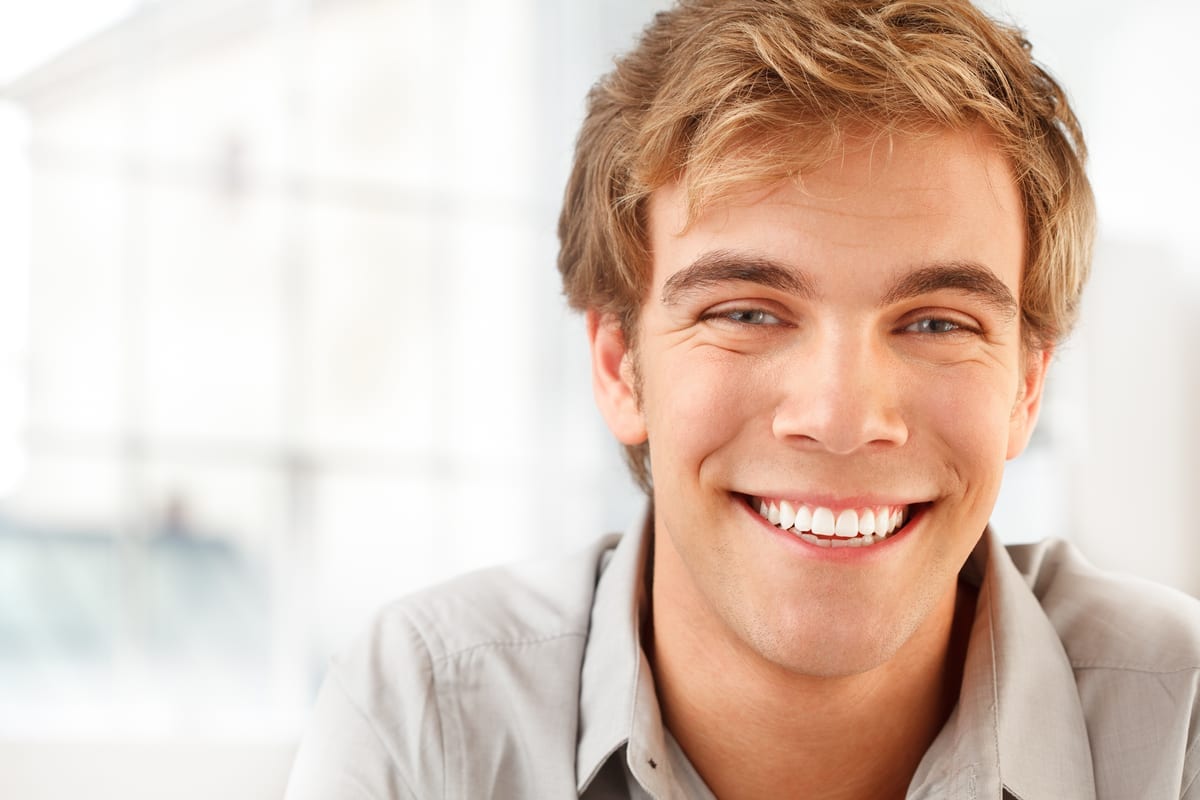 Young man with a healthy confident smile