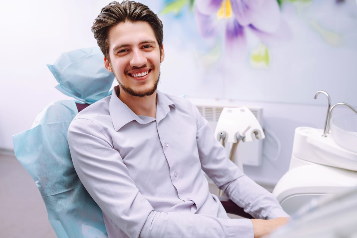 Patient smiling after cosmetic dental treatment